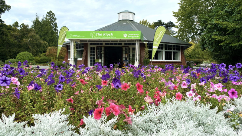 Building with flowers in foreground